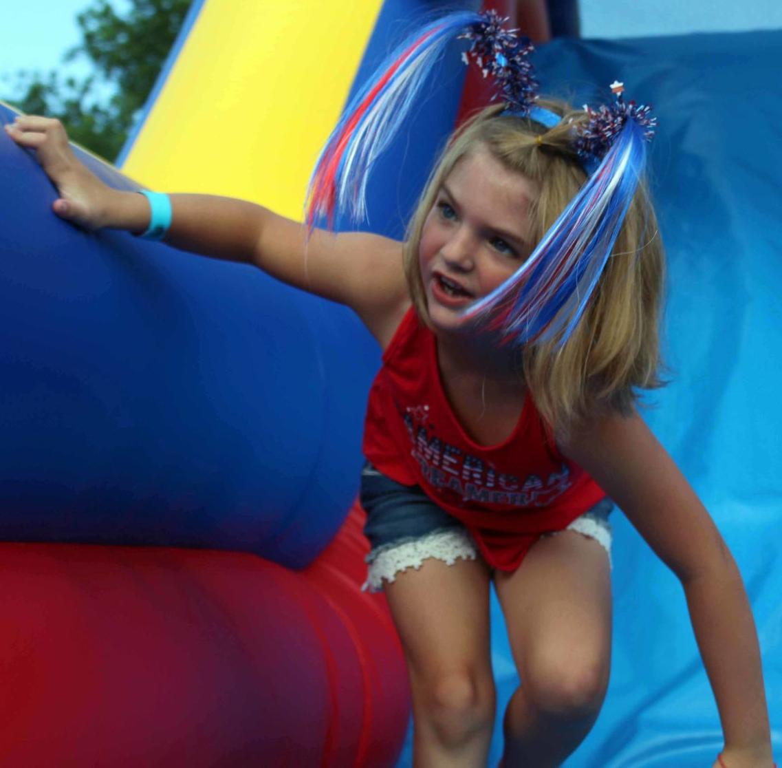 Ava on bouncy house